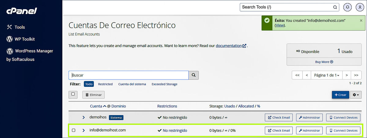 Correo creado exitosamente: aviso verde y nueva fila info@dominio en la tabla